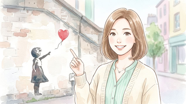 街角のレンガ壁に描かれたストリートアートを見上げてワクワクする女性