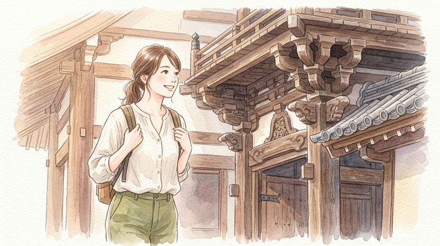 建物の細部までじっくりと見学し満足して笑顔になる女性