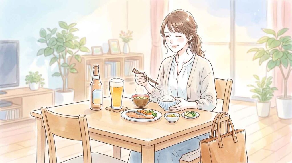  初夏の食卓で冷えたビールとノンアル飲料を楽しむ女性